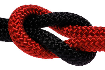 Reef-knot of black and red rope