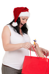 Pregnant woman with shopping bags