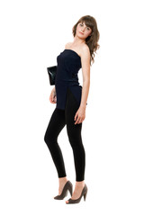 Fototapeta premium Pretty girl in a black leggings. Isolated