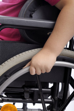 Close-up On Hand Of Child In Wheelchair