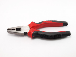 Black and red pliers with isolated on the white background