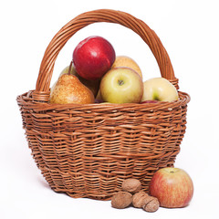 The basket of apples & few walnuts