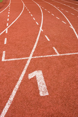 Number one on the start of a running track