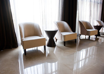 chairs close to window