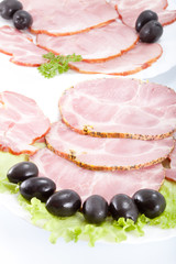 Cutting meat on a celebratory table.