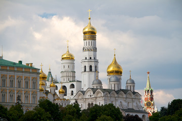Fototapeta na wymiar View of Moscow Kremlin with golden domes and Spasskaya tower