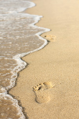 Foot prints on a beach