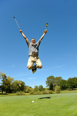 victoire d'un golfeur heureux