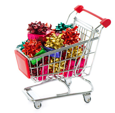Shopping cart with colorful christmas gift boxes