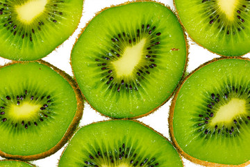 Fototapeta premium Juicy ripe green kiwi, background