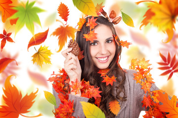 Naklejka na ściany i meble autumn woman holding cone