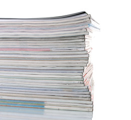 Stack of magazines isolated on white