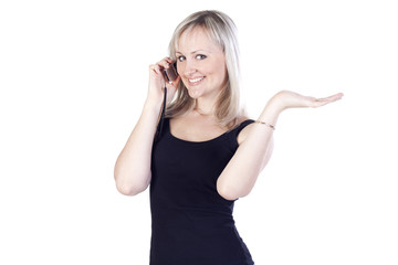 Fototapeta premium Young woman talking on the phone