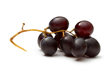 Black grape isolated on the white background