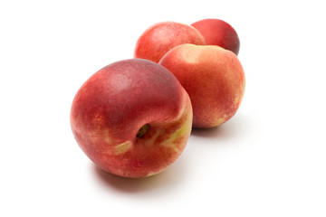 Fototapeta na wymiar Peaches isolated on the white background