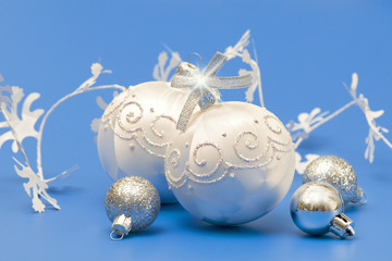 Silver christmas ball bubbles on blue background