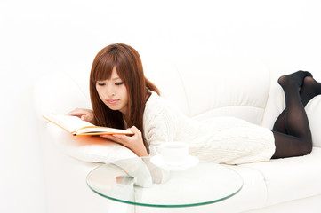 pretty asian woman reading book