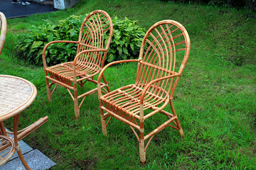 two braided easy chairs on rural market