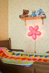 Children's bed and the included night lamp