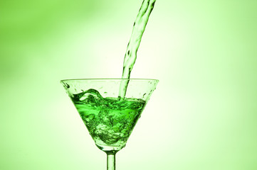 Splashing green cocktail