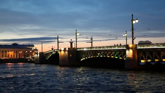 Palace Bridge on stone piers standing on Neva