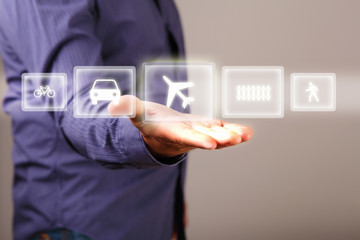 Hand touching screen with buttons on it