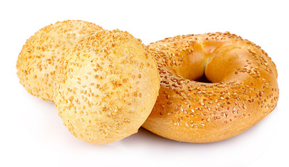 delicious buns with sesame seeds isolated on white