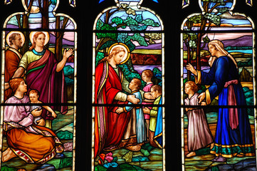Colorful stained glass window showing Jesus