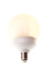 Energy saving fluorescent light bulb isolated