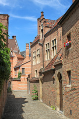 Fototapeta na wymiar Old narrow street in medieval a city
