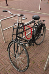 Obraz na płótnie Canvas black bicycle with red chain