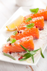 Fresh salmon with sea salt, pink pepper,rosemary and basil