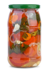Glass jar with marinated tomatoes and vegetables