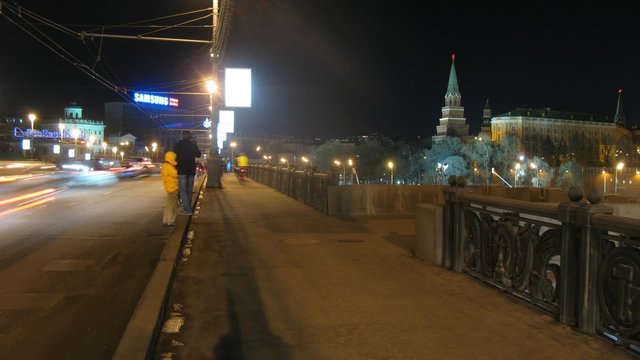 On bridge at night, time lapse