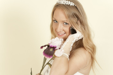 girl in a wedding dress on  cell phone call