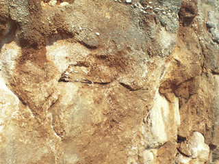 Gold rock texture closeup background.