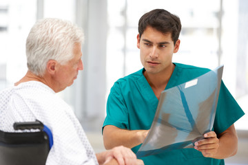 Senior patient with young doctor