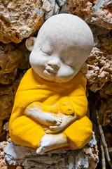 Fototapeta na wymiar Earthenware of child monk