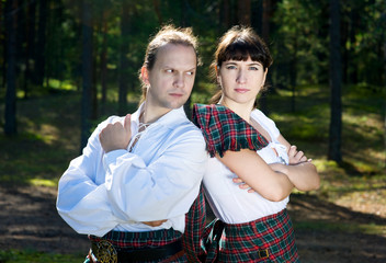 Man and woman in scottish costume
