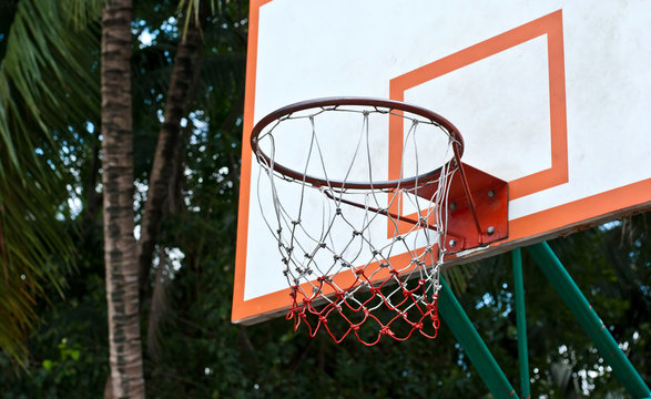 Closeup of an outdoor basketball basket.