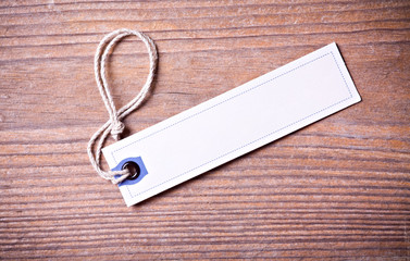 Blank tag tied with brown string.