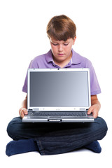 Boy with laptop blank screen