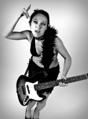 Fototapeta premium Girl on rock guitar