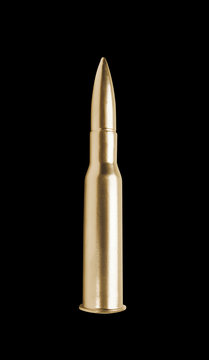 golden gun bullet isolated on black background