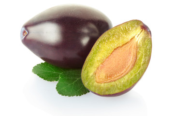 Plum with leaves on white, clipping path included