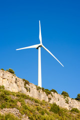 Fototapeta na wymiar aerogenerator windmill in rocky mountain