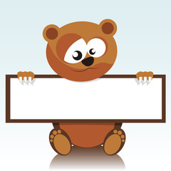 Obraz premium bear holding a signboard