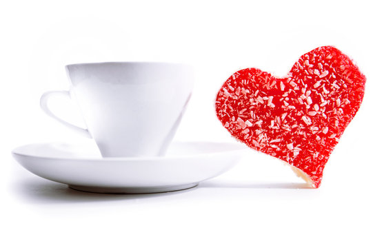 Mugs of coffee with sweet heart