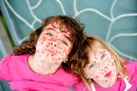 child girls mischief pretending lipstick measles