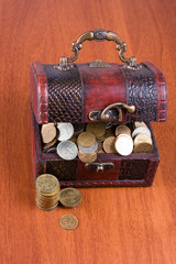 Open chest with coins